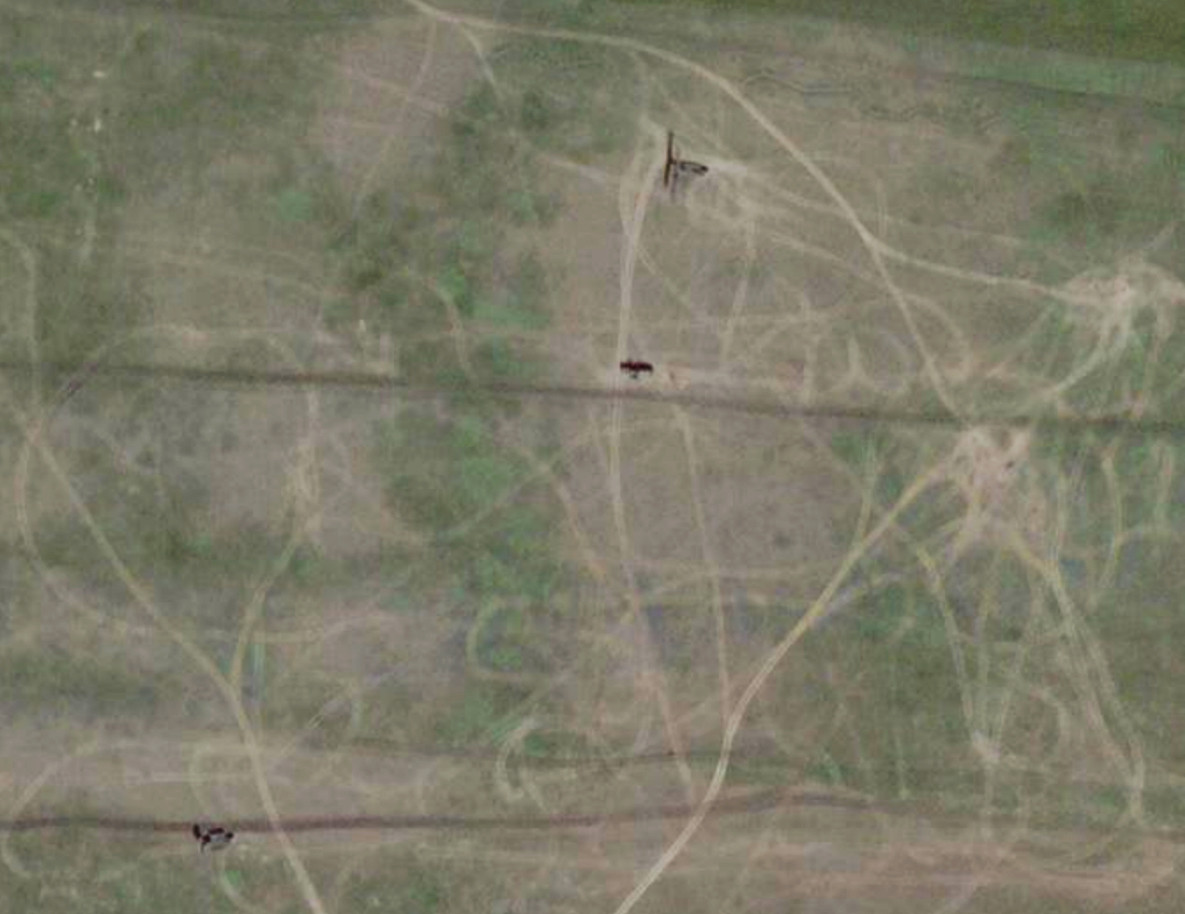 A satellite image of the same area north of the Luhansk aviation school airfield back on May 10. What looks to be three distinct elements of a Russian Nebo-M radar system are visible. <em>PHOTO © 2024 PLANET LABS INC. ALL RIGHTS RESERVED. REPRINTED BY PERMISSION</em>
