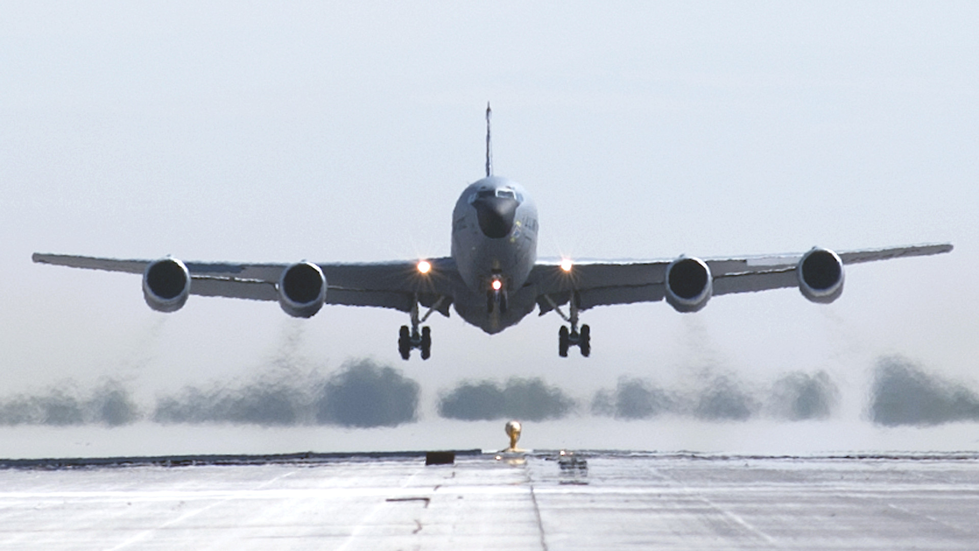 A US Air Force KC-135R aerial refueling tanker comes in to land.