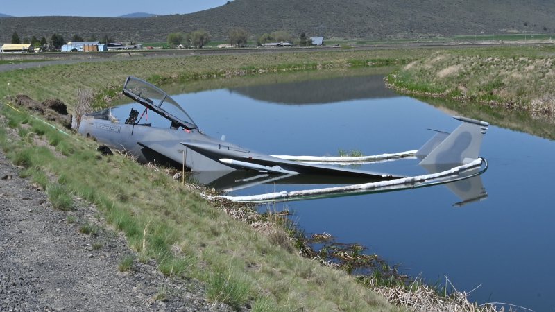 F-15 Seen Damaged In Drainage Canal After Landing Mishap (Updated)