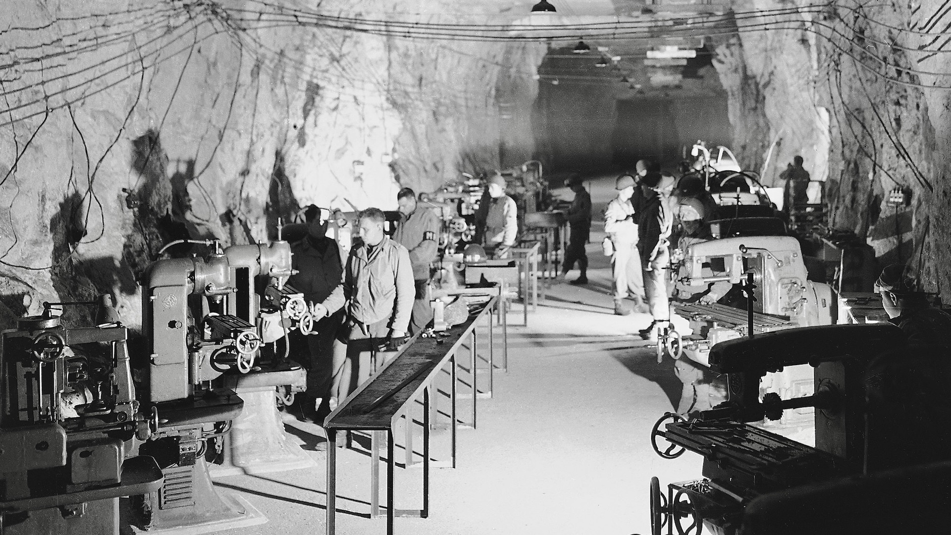 American soldiers inspect one of the machine shops at an underground robot bomb factory at Thil, north of Metz, France on Sept. 28, 1944, which yanks captured on September 11. From 100 to 150 bombs were said to be produced per day in this factory, which was located in an iron ore mine. (AP Photo)