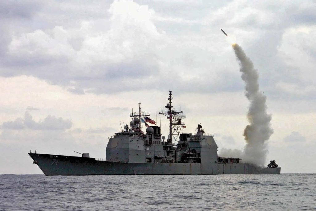 The Ticonderoga class cruiser USS Cape St. George launches a Tomahawk cruise missile.