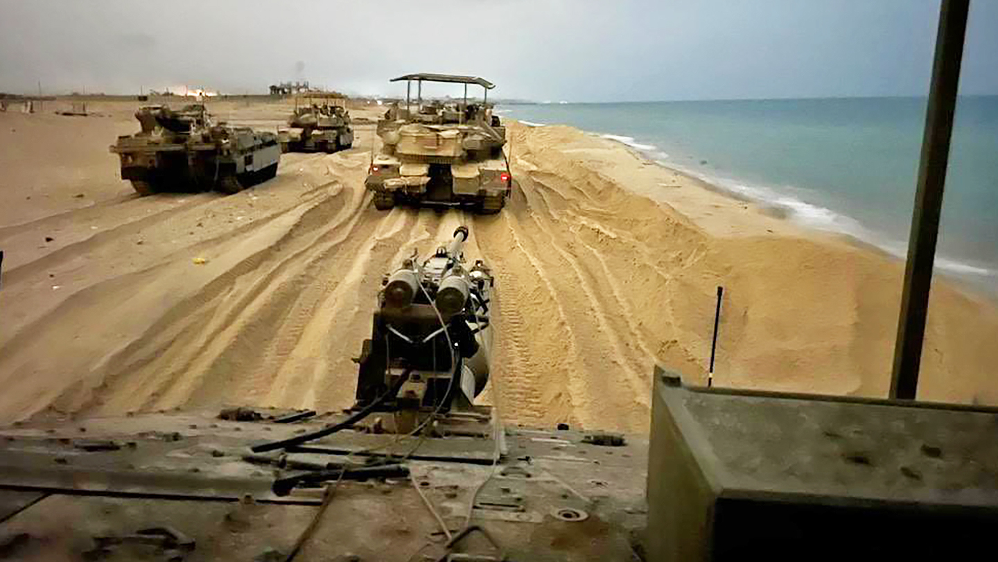 Merkava tanks roll on the Gaza beach