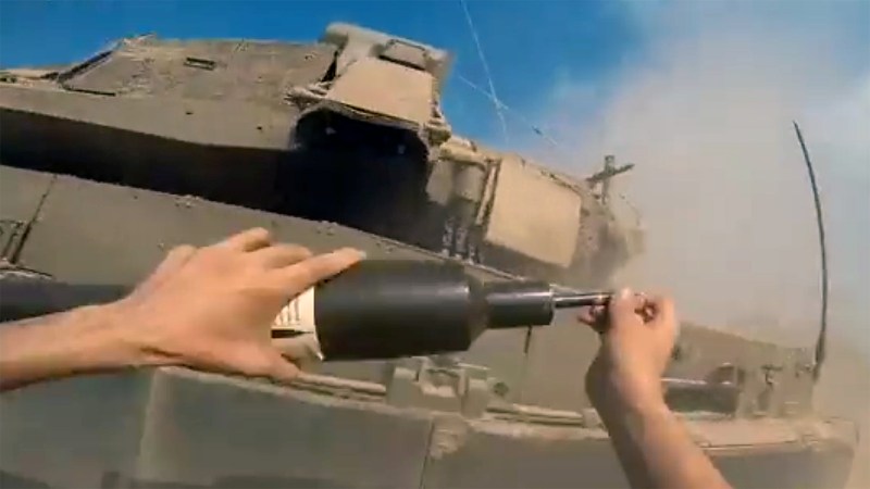Hamas Fighter Shown Placing Bomb On Israeli Merkava Tank