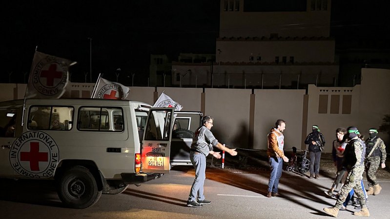 Hamas hands over 11 Israeli hostages to Red Cross officials