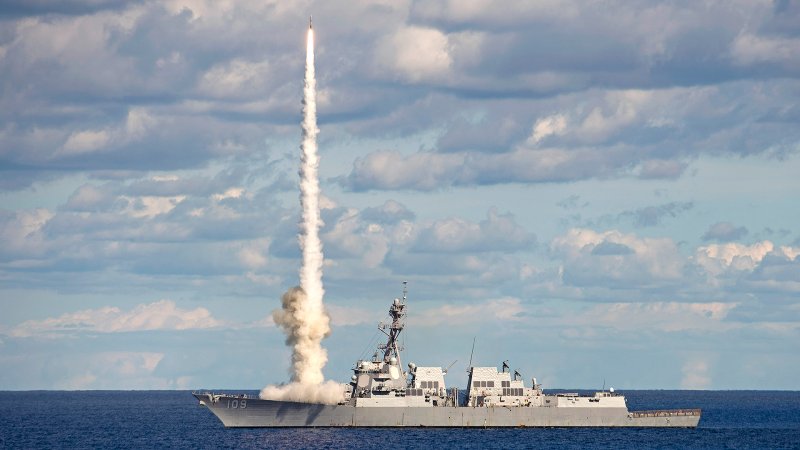 Arleigh Burke firing SM-2 missile.