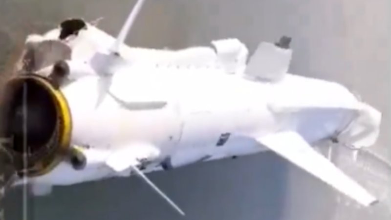 Video has emerged that looks to show the large intact remains of a Ukrainian R-360 Neptune cruise missile that is said to have washed ashore in Russia.