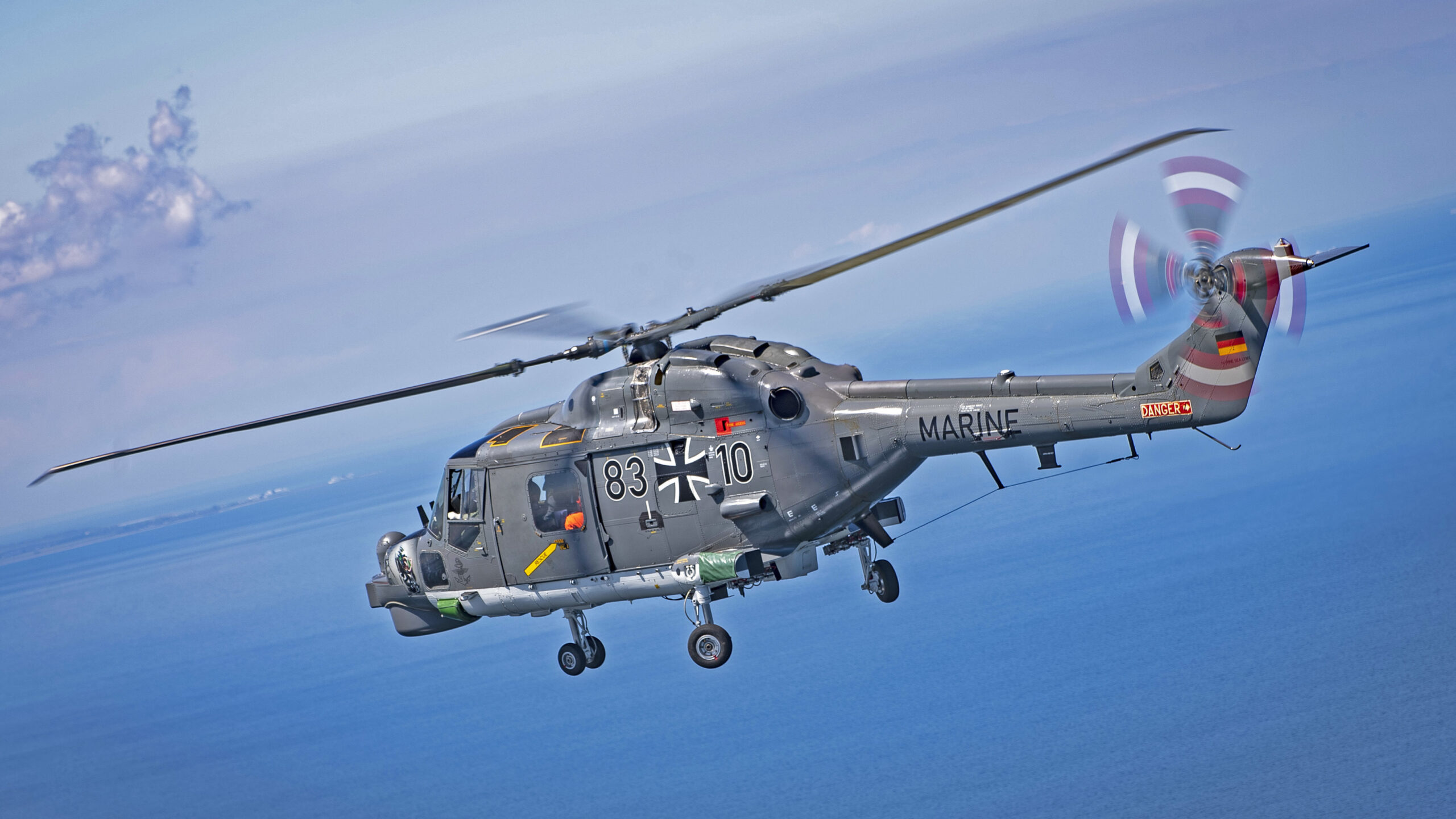 A German Mk 88A Super Lynx helicopter piloted by German military service members flies over the Blue Ridge-class command and control ship USS Mount Whitney (LCC 20) while participating in exercise Baltic Operations (BALTOPS) 2020 in the Baltic Sea, June 8, 2020. BALTOPS is the premier annual maritime-focused exercise in the Baltic Region, marking the 49th year of one of the largest exercises in Northern Europe enhancing flexibility and interoperability among allied and partner nations.