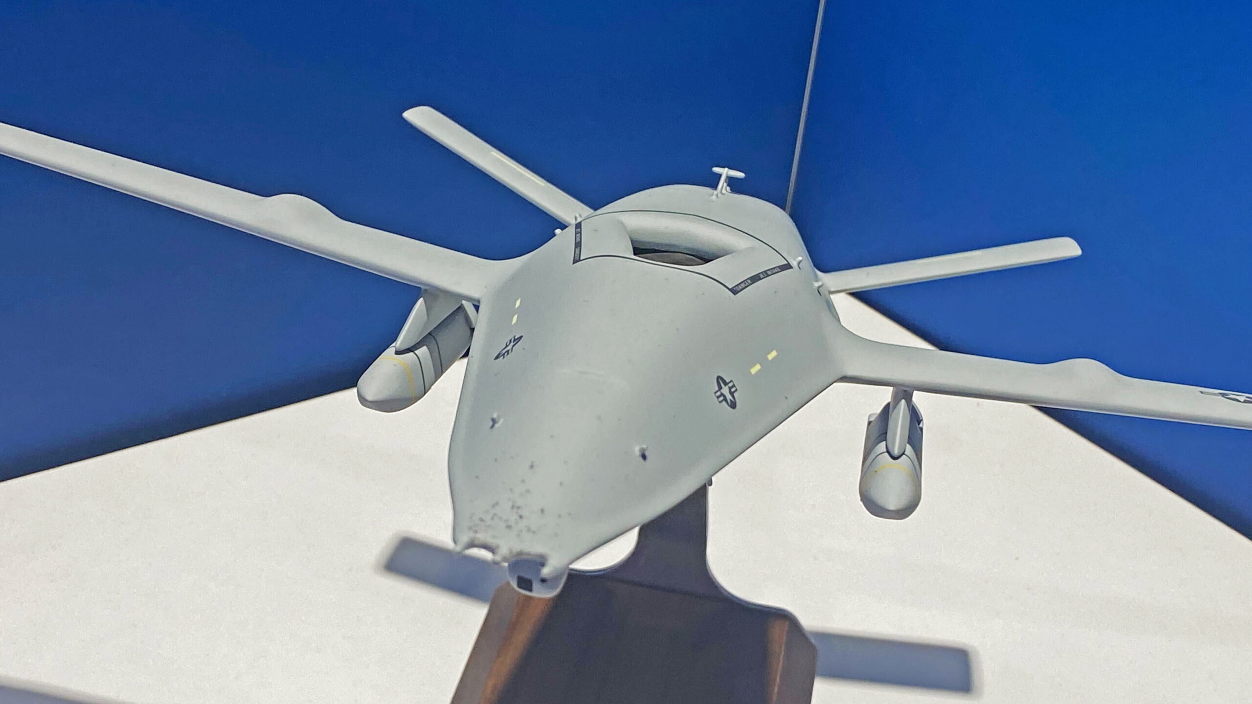 Boeing has displayed a model of its MQ-25 Stingray carrier-based tanker drone armed with a pair of stealthy Lockheed Martin AGM-158C Long-Range Anti-Surface Missiles (LRASM).