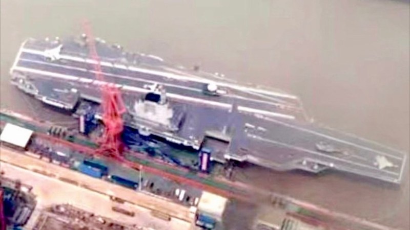 Mockups Of China’s Sharp Sword Stealth Drone Appear Near New Supersized Amphibious Warship