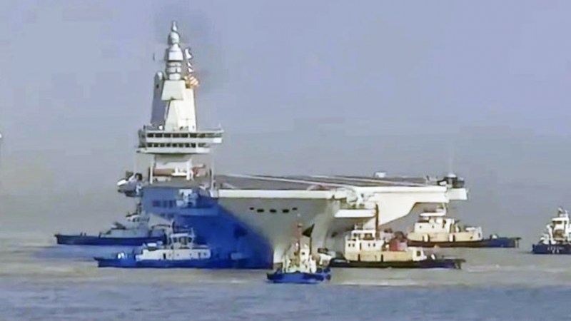 Mockups Of China’s Sharp Sword Stealth Drone Appear Near New Supersized Amphibious Warship