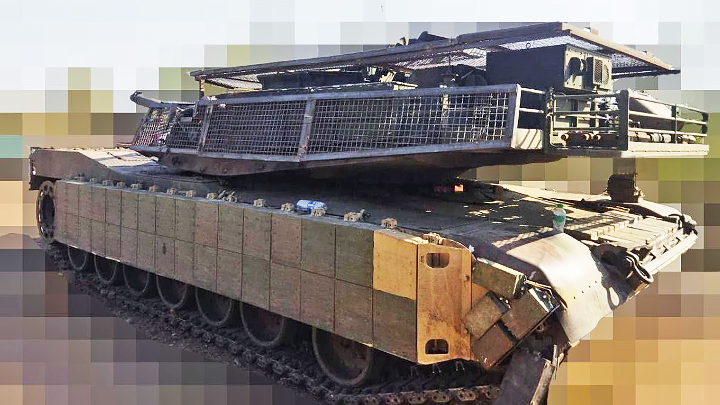 Ukrainian M1 Abrams Tanks Get Elaborate 'Cope Cages,' Soviet Explosive  Reactive Armor