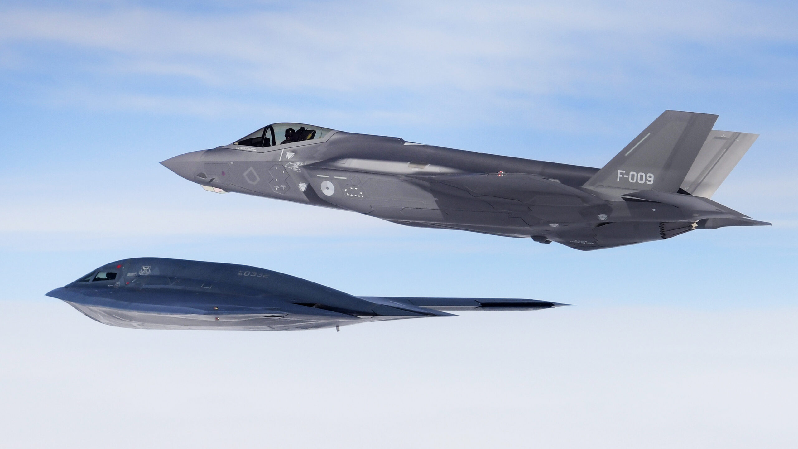 A U.S. B-2A Spirit bomber assigned to the 509th Bomb Wing and a Royal Netherlands air force F-35A conduct aerial operations in support of Bomber Task Force Europe 20-2 over the North Sea March 18, 2020. Bomber missions provide opportunities to train and work with NATO allies and theater partners in combined and joint operations and exercises.
