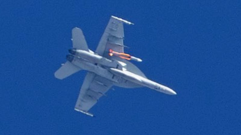 Photos have emerged showing a U.S. Navy F/A-18E/F Super Hornet carrying what appears to be an air-launched version of the RIM-174 SM-6 missile, a weapon that can counter aerial threats at long ranges, as well as ground and surface targets.