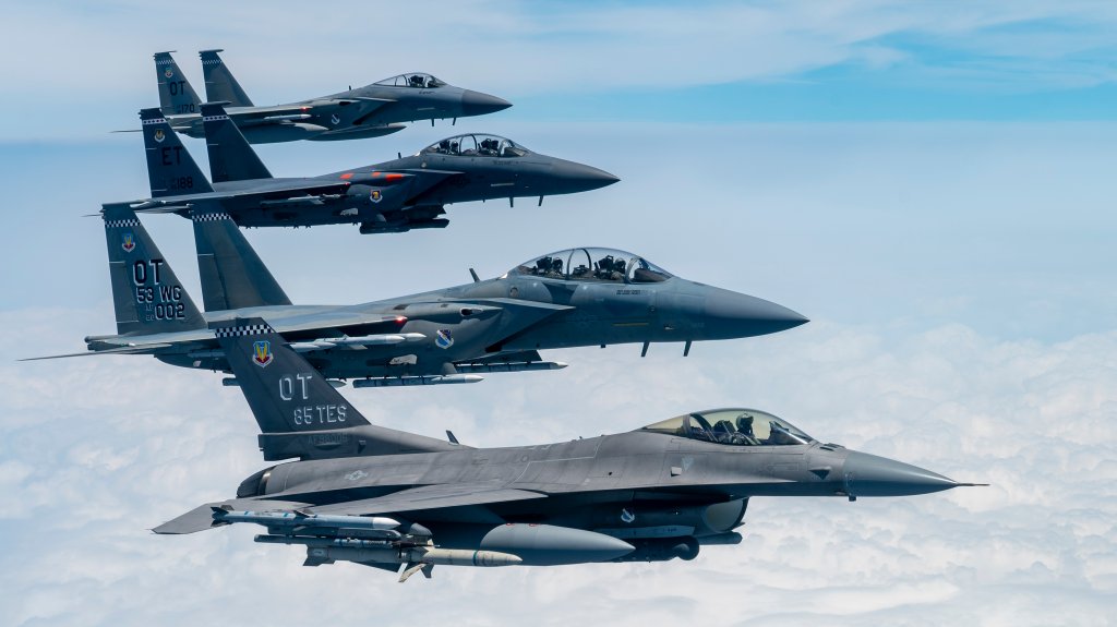 A formation including U.S. Air Force F-16C Fighting Falcon, F-15C Eagle, F-15E Strike Eagle, and F-15EX Eagle II aircraft assigned to the 85th Test and Evaluation Squadron fly over Eglin Air Force Base, Florida, May 17, 2024. The 85th Test and Evaluation Squadron conducts operational test and evaluation, tactics development, and programs for F-15C, F-15E, F-15EX, and F-16C aircraft. (U.S. Air Force photo by Staff Sgt. Blake Wiles)