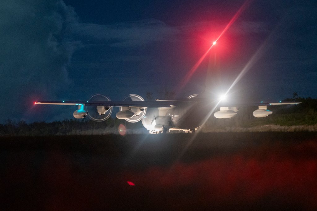 A U.S. Marine Corps KC-130J Super Hercules assigned to Marine Aerial Refueler Transport Squadron 152, Marine Aircraft Group 12, 1st Marine Aircraft Wing, conducts approach training at Northwest Field, Guam, June 11, 2024. Exercises such as Valiant Shield allow the Indo-Pacific Command Joint Forces the opportunity to integrate forces from all branches of service and with our allies to conduct precise, lethal, and overwhelming multi-axis, multi-domain effects that demonstrate the strength and versatility of the Joint Force and our commitment to a free and open Indo-Pacific. (U.S. Air Force photo by Staff Sgt. Kristen Heller)