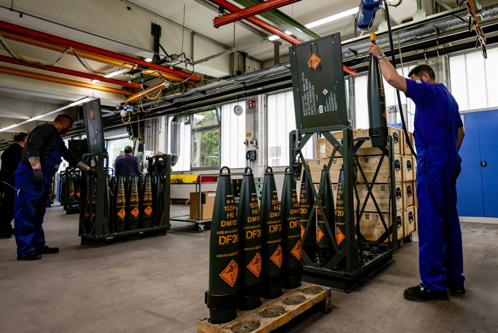 Technicians of German armaments company and automotive supplier Rheinmetall work on 155mm ammunition that will be delivered to Ukrainian Forces for the Panzerhaubitze 2000 (armoured howitzer 2000), a 155mm self-propelled howitzer, at the facility of Rheinmetall in Unterluess, northern Germany, on June 6, 2023. Since Russia invaded Ukraine, Germany has dropped a traditionally pacifist stance and become one of Ukraine's biggest military backers, delivering a wide array of weaponry to Kyiv. Rheinmetall has received a boost from the Ukraine war, posting record results in 2022 and joining Frankfurt's blue-chip DAX index in March 2023. (Photo by Axel Heimken / AFP) (Photo by AXEL HEIMKEN/AFP via Getty Images)