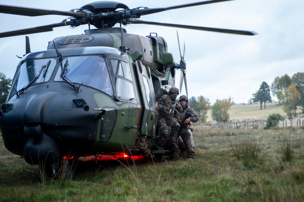 SAINT CHELY D'APCHER, FRANCE - OCTOBER 21: Soldiers from the 2nd regiment of Foreign Legion infantry disembark from a NH-90 Caiman to secure the surroundings of the city before their assault during the 2021 Baccarat training session on October 21, 2021 in Saint- Chely-d’Apcher, France.The 5th edition of the Baccarat high intensity combat training brings together 15 units, 1300 soldiers and 32 helicopters. (Photo by Aurelien Meunier/Getty Images)