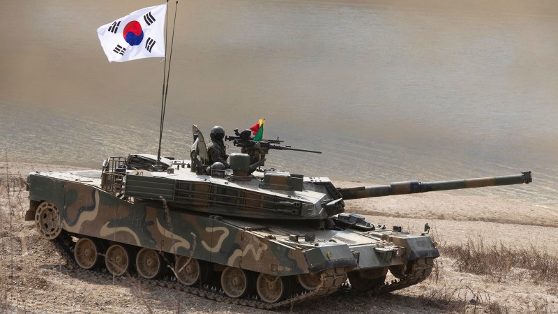 A South Korean K1E1 tank participates in a joint river-crossing exercise in Yeoncheon, Gyeonggi province on March 20, 2024. Russian’s President Putin has warned South Korea that it would be making “a big mistake” if it decided to supply weapons to Ukraine. While Seoul has so far condemned Moscow for its full-scale invasion of Ukraine and provided Kyiv with economic and humanitarian, it has stopped short of sending arms.
