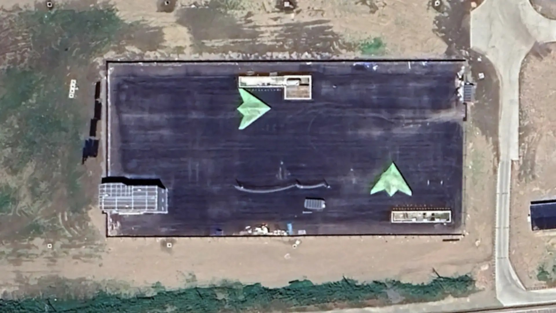 A pair of apparent mockups of the Chinese GJ-11 Sharp Sword uncrewed combat air vehicle (UCAV) have emerged at a site just over a mile from where the country is building the first of its new monster Type 076 amphibious assault ships.