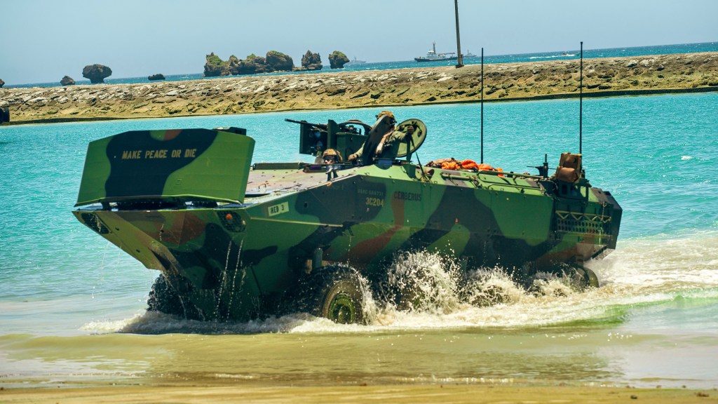 U.S. Marine Corps Amphibious Combat Vehicles attached to Alpha Company, Battalion Landing Team 1/5, 15th Marine Expeditionary Unit, conduct an amphibious landing after waterborne operations at White Beach Naval Facility, Okinawa, Japan, June 24, 2024. Harpers Ferry and embarked elements of the 15th MEU are conducting routine operations in the U.S. 7th Fleet area of operations. 7th Fleet is the U.S. Navy’s largest forward-deployed numbered fleet, and routinely interacts and operates with allies and partners in preserving a free and open Indo-Pacific region. (U.S. Marine Corps photo by Lance Cpl. Peyton Kahle)