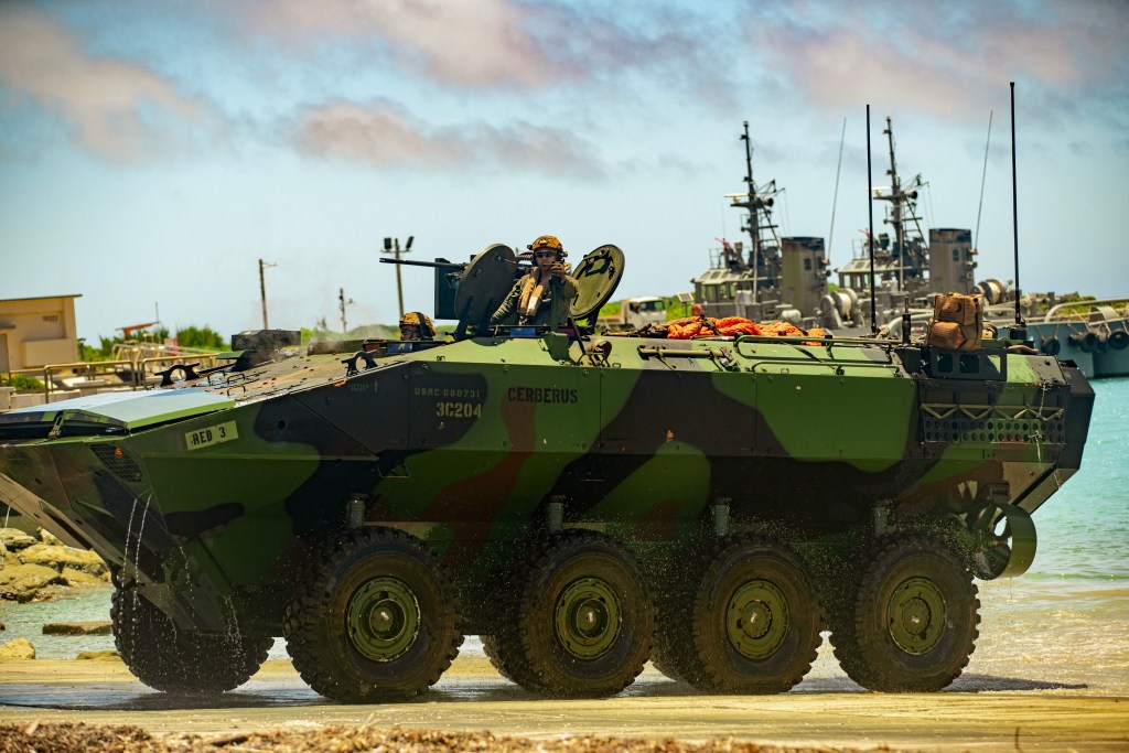 U.S. Marine Corps Amphibious Combat Vehicles attached to Alpha Company, Battalion Landing Team 1/5, 15th Marine Expeditionary Unit, drive ashore after an amphibious landing at White Beach Naval Facility, Okinawa, Japan, June 24, 2024. Harpers Ferry and embarked elements of the 15th MEU are conducting routine operations in the U.S. 7th Fleet area of operations. 7th Fleet is the U.S. Navy’s largest forward-deployed numbered fleet, and routinely interacts and operates with allies and partners in preserving a free and open Indo-Pacific region. (U.S. Marine Corps photo by Lance Cpl. Peyton Kahle)