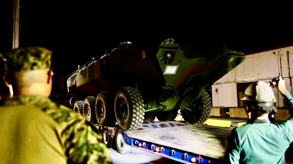 U.S. Marines disembark Amphibious Combat Vehicles at Naha Military Port, Okinawa, Japan, June 29, 2024. The arrival of the ACV to 3d Marine Division realizes a long-projected update to the current armed ship-to-shore connection and ground combat capabilities of the Assault Amphibious Vehicle. The ACV is designed for conducting amphibious operations in support of the Joint Force with allies and partners in distributed maritime environments. The Marines are with 4th Marine Regiment, 3d Marine Division. (U.S. Marine Corps photo by Sgt. Alyssa Chuluda)