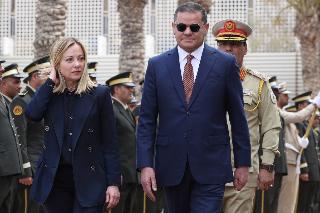 Libya's interim Prime Minister Abdulhamid Dbeibah (R) welcomes Italy's Prime Minister Giorgia Meloni as she arrives for a meeting in Tripoli on May 7, 2024. (Photo by Mahmud Turkia / AFP) (Photo by MAHMUD TURKIA/AFP via Getty Images)