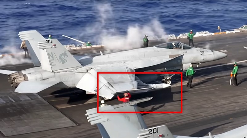 A look at an AIM-174 air-launched version of the SM-6 missile with previously unseen markings under the wing of a Super Hornet aboard the USS Carl Vinson has emerged.