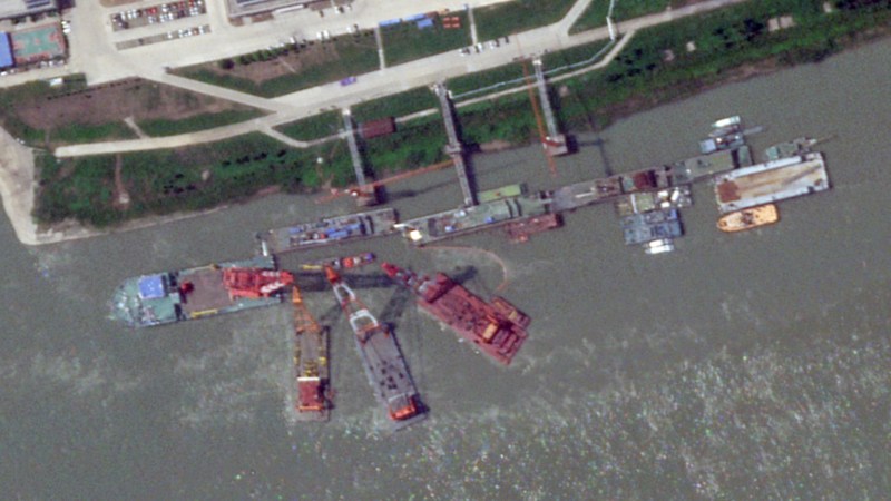 Satellite imagery shows curious activity, including a cluster of crane barges, at a prominent shipyard in China over a period of several days in June 2024.