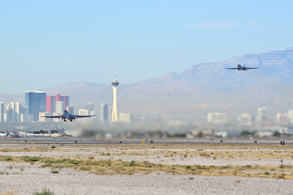 Two U.S. Air Force B-1B Lancers assigned to the 37th Bomb Squadron takeoff during Bamboo Eagle 24-3 at Nellis Air Force Base, Nev., Aug. 5, 2024. The United States’ success in the evolving landscape of warfare depends on how well U.S. forces can combine with the broad range of capabilities and expertise within the DOD to secure common interests and promote shared values. (U.S. Air Force photo by Airman 1st Class Brittany Kenney)