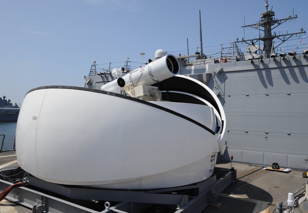 The Laser Weapon System (LaWS) temporarily installed aboard the guided-missile destroyer USS Dewey (DDG 105) in San Diego, Calif., is a technology demonstrator built by the Naval Sea Systems Command from commercial fiber solid state lasers, utilizing combination methods developed at the Naval Research Laboratory. LaWS can be directed onto targets from the radar track obtained from a MK 15 Phalanx Close-In Weapon system or other targeting source. The Office of Naval Research's Solid State Laser portfolio includes LaWS development and upgrades providing a quick reaction capability for the fleet with an affordable SSL weapon prototype. This capability provides Navy ships a method for Sailors to easily defeat small boat threats and aerial targets without using bullets. (U.S. Navy photo by John F. Williams/Released)