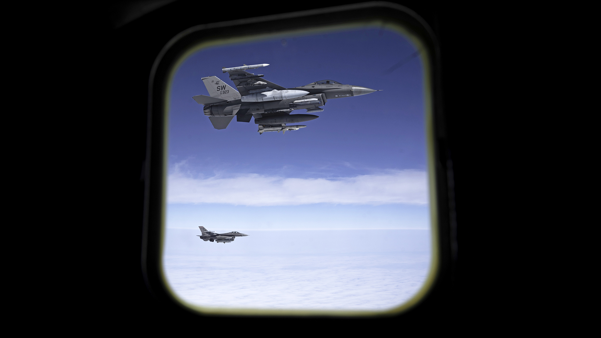 Two U.S. Air Force F-16 Fighting Falcons assigned to the 92nd Fighter Squadron, Shaw Air Force Base, South Carolina, fly alongside a KC-135 Stratotanker assigned to the 91st Air Refueling Squadron over the western United States during Exercise Bamboo Eagle 24-3, Aug. 5, 2024. Through employment of the KC-135 aircraft, the 91st ARS extends U.S. global power and global reach by planning and executing aerial refueling missions for U.S. and allied combat and support aircraft. During Bamboo Eagle, Air Mobility Command assets will support warfighters implementing all-domain combat-power generation from disaggregated basing locations throughout the western part of the U.S., along with distributed command and control, agile logistics, and tactical air-to-air refueling. Bamboo Eagle provides participating units opportunities to reoptimizing for Great Power competition and to focus on mission readiness by to deliver cross-functional and lethal combat capabilities with the speed and agility required to meet pacing challenges. (U.S. Air Force photo by Tech. Sgt. Alexander Cook)