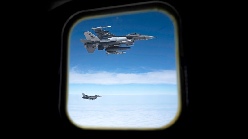 Two U.S. Air Force F-16 Fighting Falcons assigned to the 92nd Fighter Squadron, Shaw Air Force Base, South Carolina, fly alongside a KC-135 Stratotanker assigned to the 91st Air Refueling Squadron over the western United States during Exercise Bamboo Eagle 24-3, Aug. 5, 2024. Through employment of the KC-135 aircraft, the 91st ARS extends U.S. global power and global reach by planning and executing aerial refueling missions for U.S. and allied combat and support aircraft. During Bamboo Eagle, Air Mobility Command assets will support warfighters implementing all-domain combat-power generation from disaggregated basing locations throughout the western part of the U.S., along with distributed command and control, agile logistics, and tactical air-to-air refueling. Bamboo Eagle provides participating units opportunities to reoptimizing for Great Power competition and to focus on mission readiness by to deliver cross-functional and lethal combat capabilities with the speed and agility required to meet pacing challenges. (U.S. Air Force photo by Tech. Sgt. Alexander Cook)