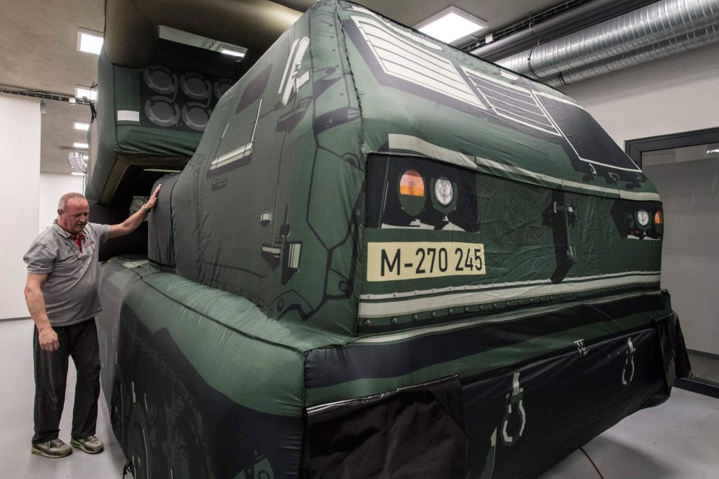 An inflatable decoy of a M270 MLRS HIMARS military vehicle is displayed during a media presentation in Decin, Czech Republic on March 6, 2023. - A Czech company producing inflatable weapon decoys such as Himars rocket launchers has seen profits soar since the Russian invasion of Ukraine started last year, its officials said on March 6. The Inflatech company based in the northern Czech city of Decin and founded eight years ago makes more than 30 types of inflatable weapons. (Photo by Michal Cizek / AFP) (Photo by MICHAL CIZEK/AFP via Getty Images)