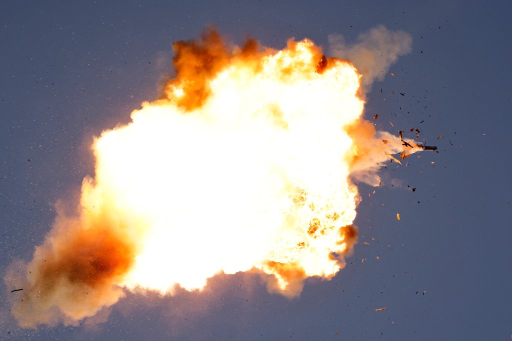 This photo taken from a position in northern Israel shows a Hezbollah UAV intercepted by Israeli air forces over north Israel on August 25, 2024. The Israeli military announced early August 25, 2024 that it was conducting pre-emptive strikes in Lebanon after detecting preparations for "large-scale" attacks by the Iran-backed militant group Hezbollah. Hezbollah said August 25, 2024 it had launched more than 320 rockets at Israel overnight, targeting a string of military positions, even as Israel's military said it was carrying out pre-emptive strikes against the group. (Photo by Jalaa MAREY / AFP) (Photo by JALAA MAREY/AFP via Getty Images)