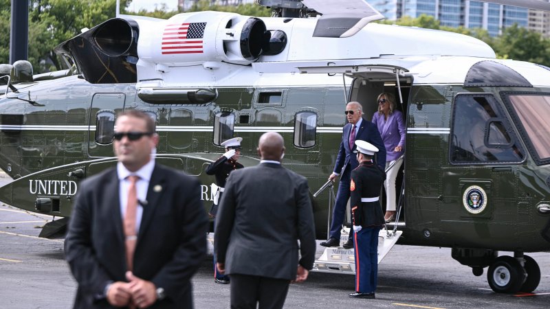 US President Joe Biden and First Lady Jill Biden step off of Marine One, the new model Sikorsky VH-92A, upon arrival at Soldier Field Landing zone in Chicago, Illinois, on August 19, 2024. President Biden is delivering the keynote address at the Democratic National Convention opening night.