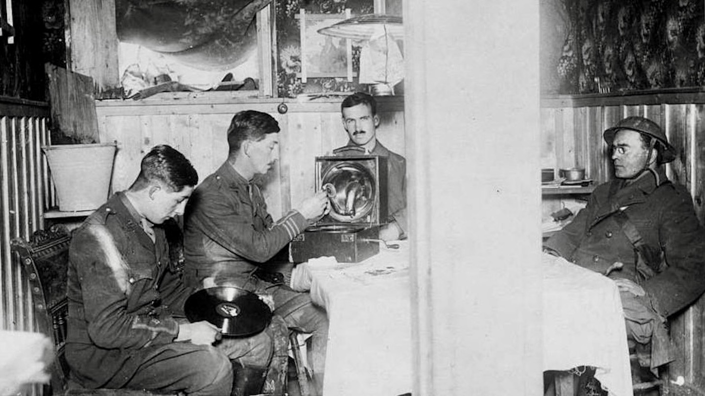 Four soldiers in a captured German dugout