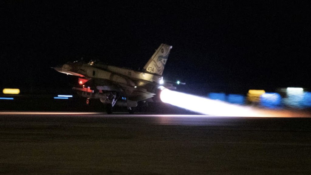 A handout photo released overnight by the IDF shows an Israeli fighter jet taking off at an unidentified location.