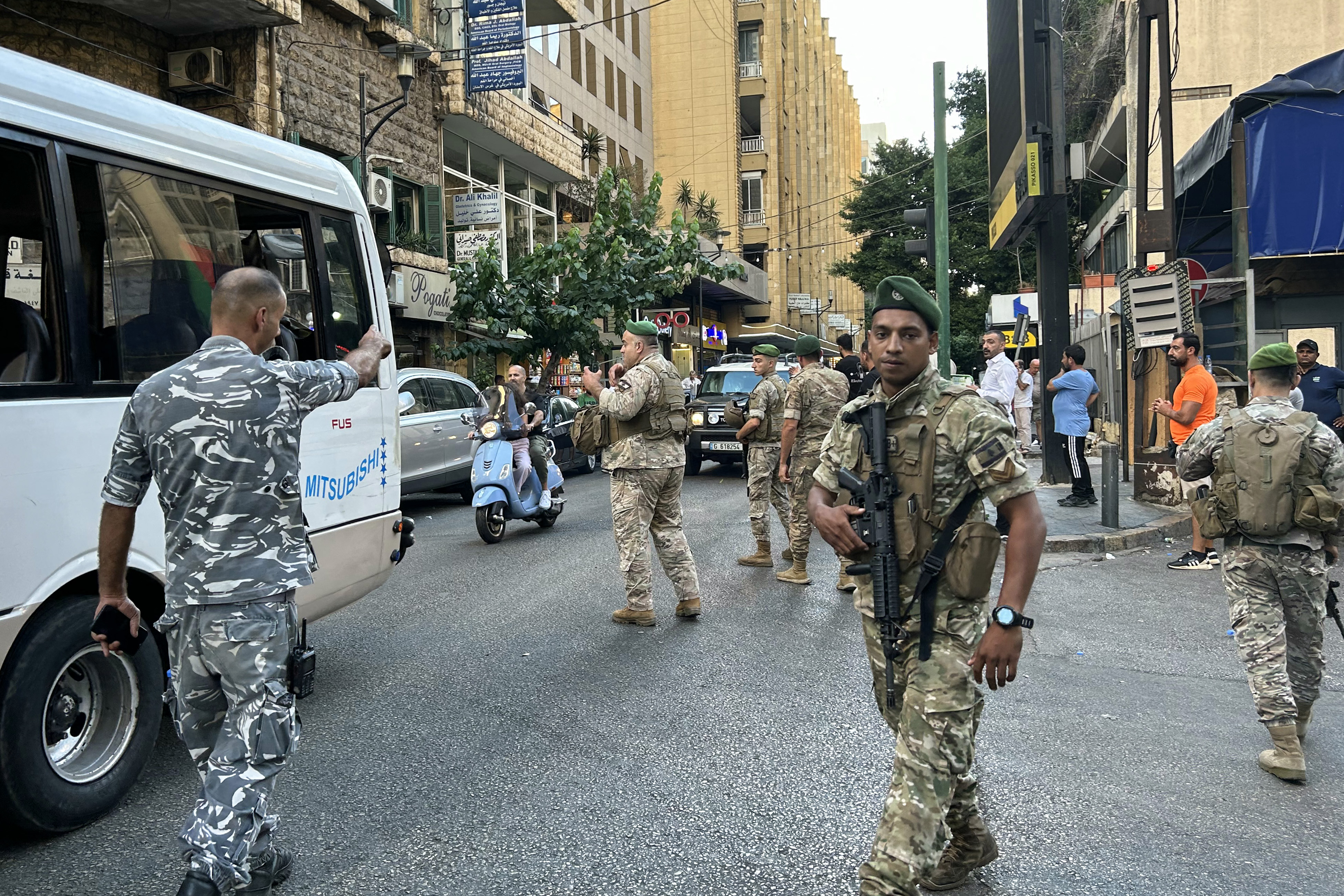 Lebanese army soldiers stand guard in Beirut on September 17, 2024, after explosions hit locations in several Hezbollah strongholds around Lebanon amid ongoing cross-border tensions between Israel and Hezbollah fighters. Hundreds of people were wounded when Hezbollah members' paging devices exploded simultaneously across Lebanon on September 17, in what a source close to the militant movement said was an "Israeli breach" of its communications. (Photo by Anwar AMRO / AFP) (Photo by ANWAR AMRO/AFP via Getty Images)