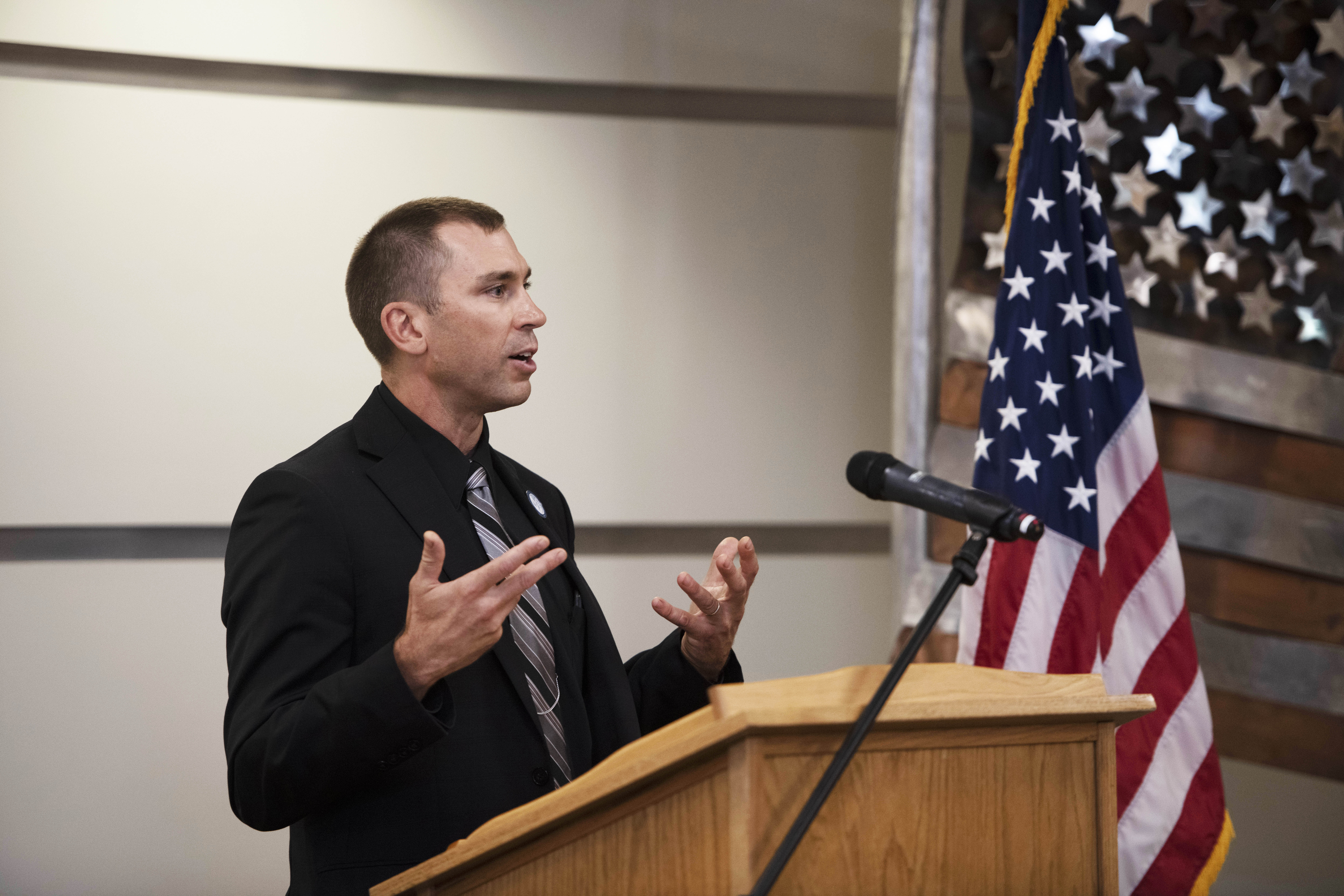 Dr. Derek Tournear, Space Development Agency director, delivers a speech during the SDA Test and Checkout Center basing announcement, Aug. 7, 2023, on Grand Forks Air Force Base, North Dakota. Tournear spoke about the Proliferated Warfighter Space Architecture, a constellation of hundreds of space vehicles composing Transport and Tracking Layers that will be the backbone for the Joint All Domain Command and Control infrastructure. (U.S. Air Force photo by Airman 1st Class Raisa Christie)