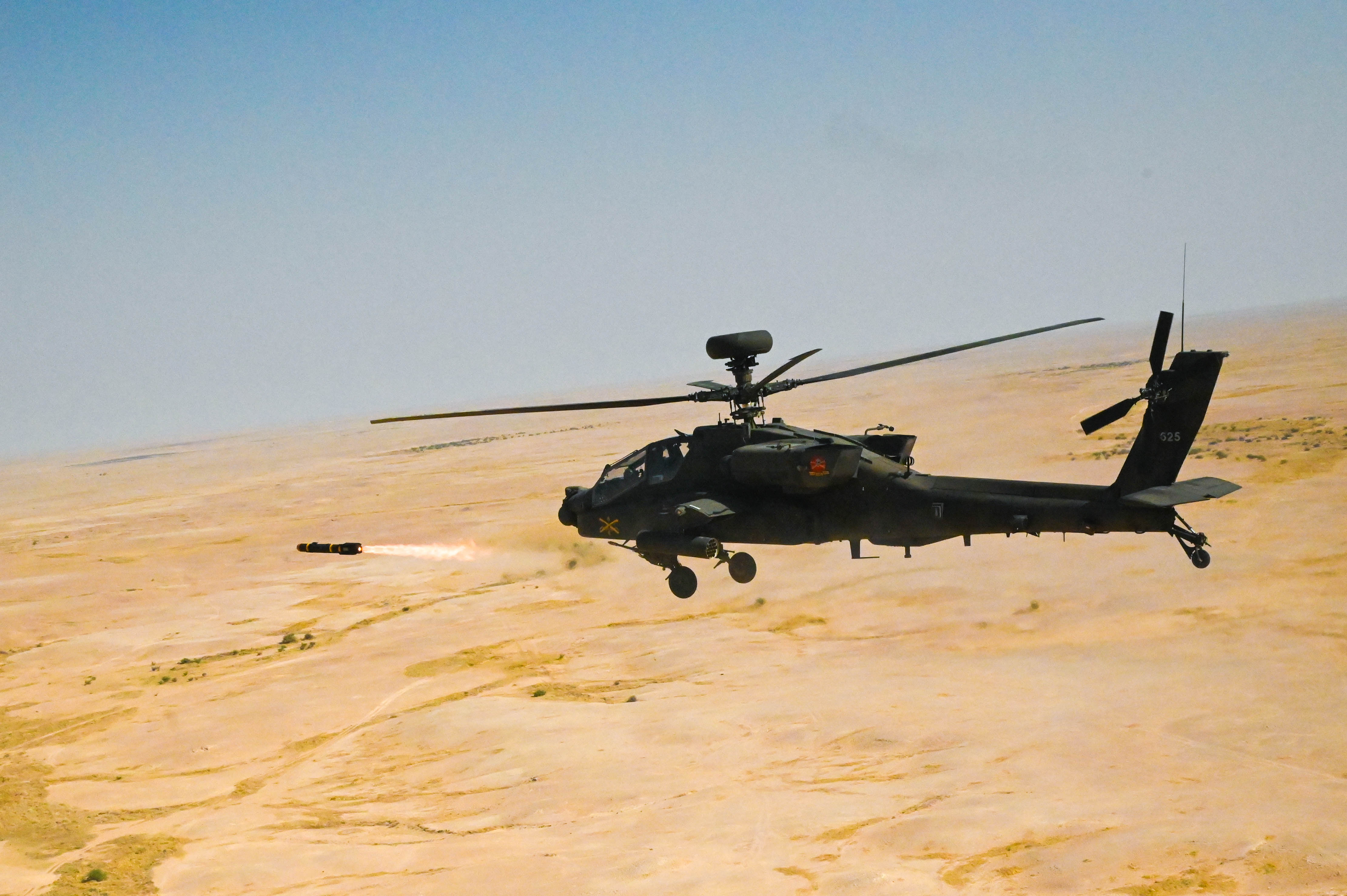 A U.S. Army AH-64 Apache fires a Hellfire missile at a small-UAS for Red Sands IEC in the CENTCOM AOR Sept. 23, 2024.(U.S. Army photo by Spc. Dean John Kd De Dios)