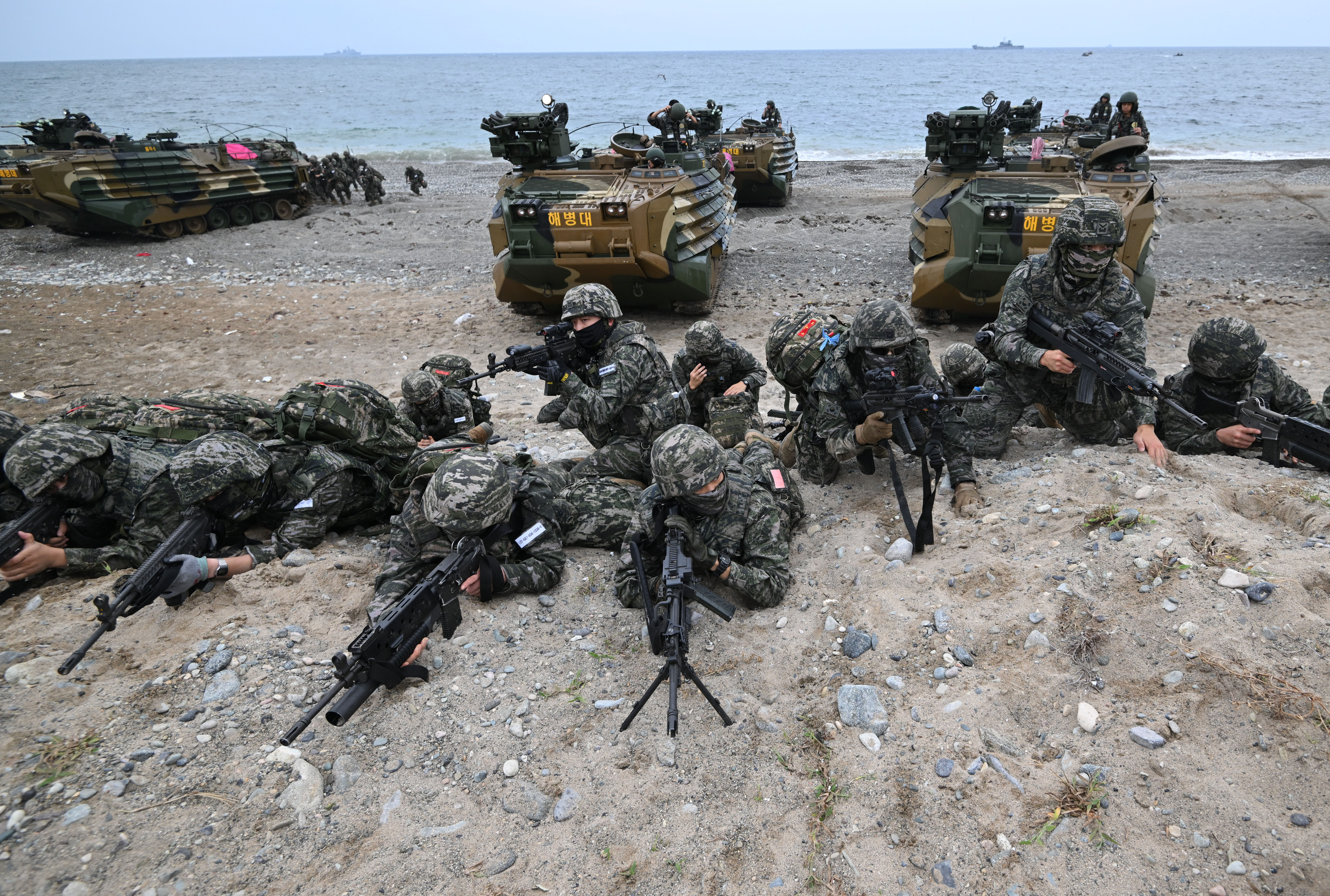 South Korean marines exit an amphibious assault vehicle on a beach during the "Ssangyong 2024 Exercise" joint landing operation by US and South Korean Marines in the south-eastern port city of Pohang on September 2, 2024. (Photo by Jung Yeon-je / AFP) (Photo by JUNG YEON-JE/AFP via Getty Images)