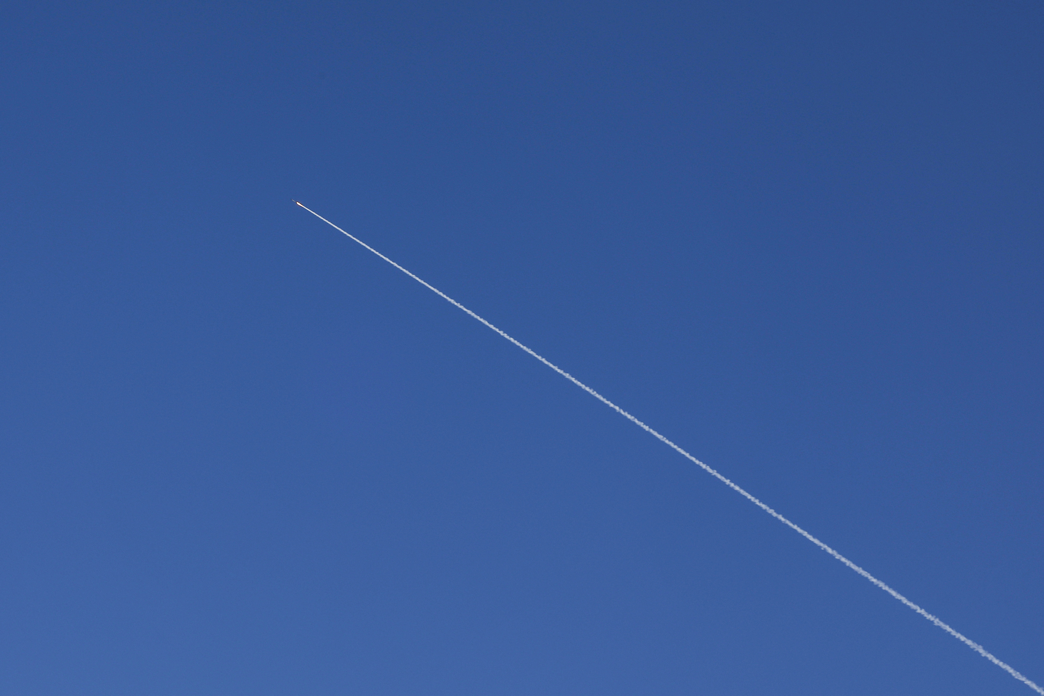 A missile of Israel's Iron Dome missile-defence system cruises to intercept rockets over the northern city of Acre on October 1, 2024. (Photo by Ahmad GHARABLI / AFP) (Photo by AHMAD GHARABLI/AFP via Getty Images)