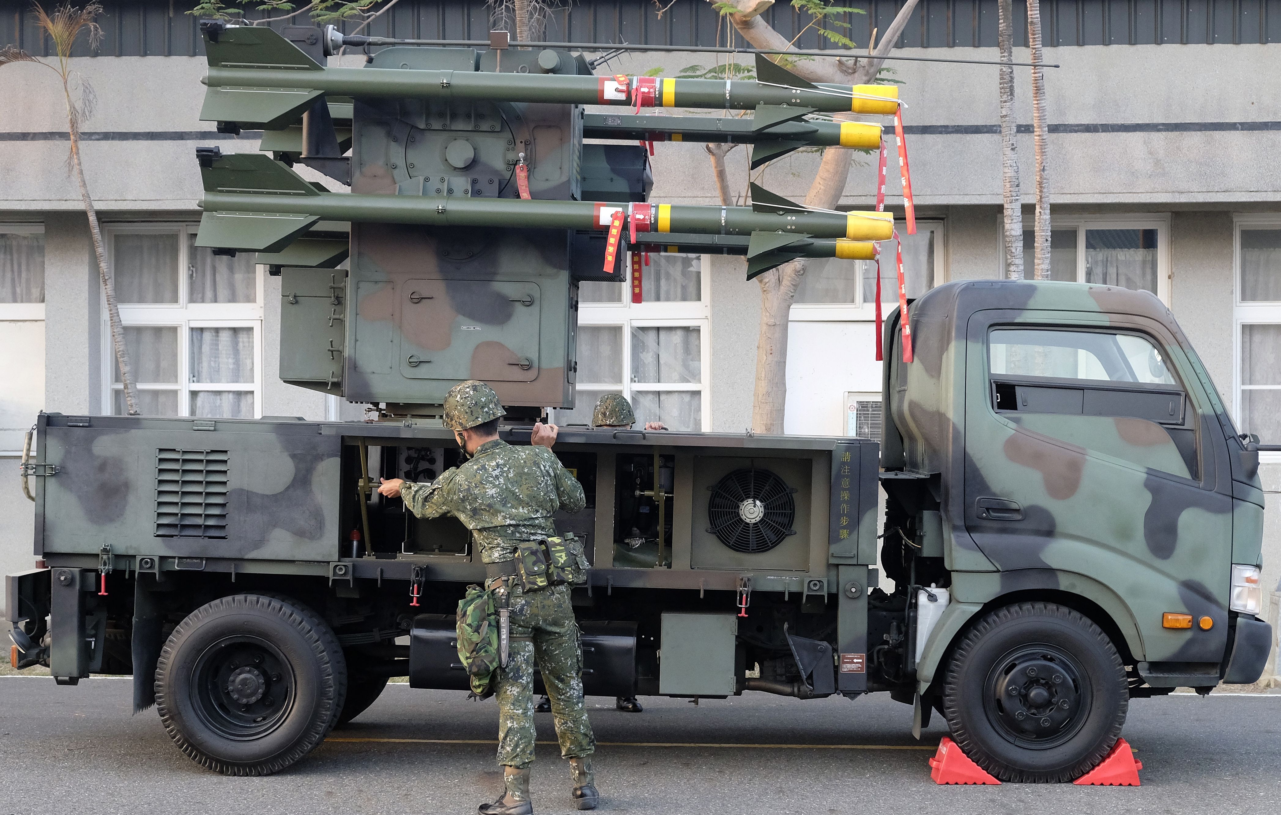 A Taiwan soldier operates home-made Tien Chien surface-to-air missiles during an annual drill in Tainan on January 17, 2017. Taiwan began two days of military drills on January 17 simulating an attack by China as the government sought to reassure the public in the face of deteriorating relations with Beijing. / AFP / Sam YEH (Photo credit should read SAM YEH/AFP via Getty Images)