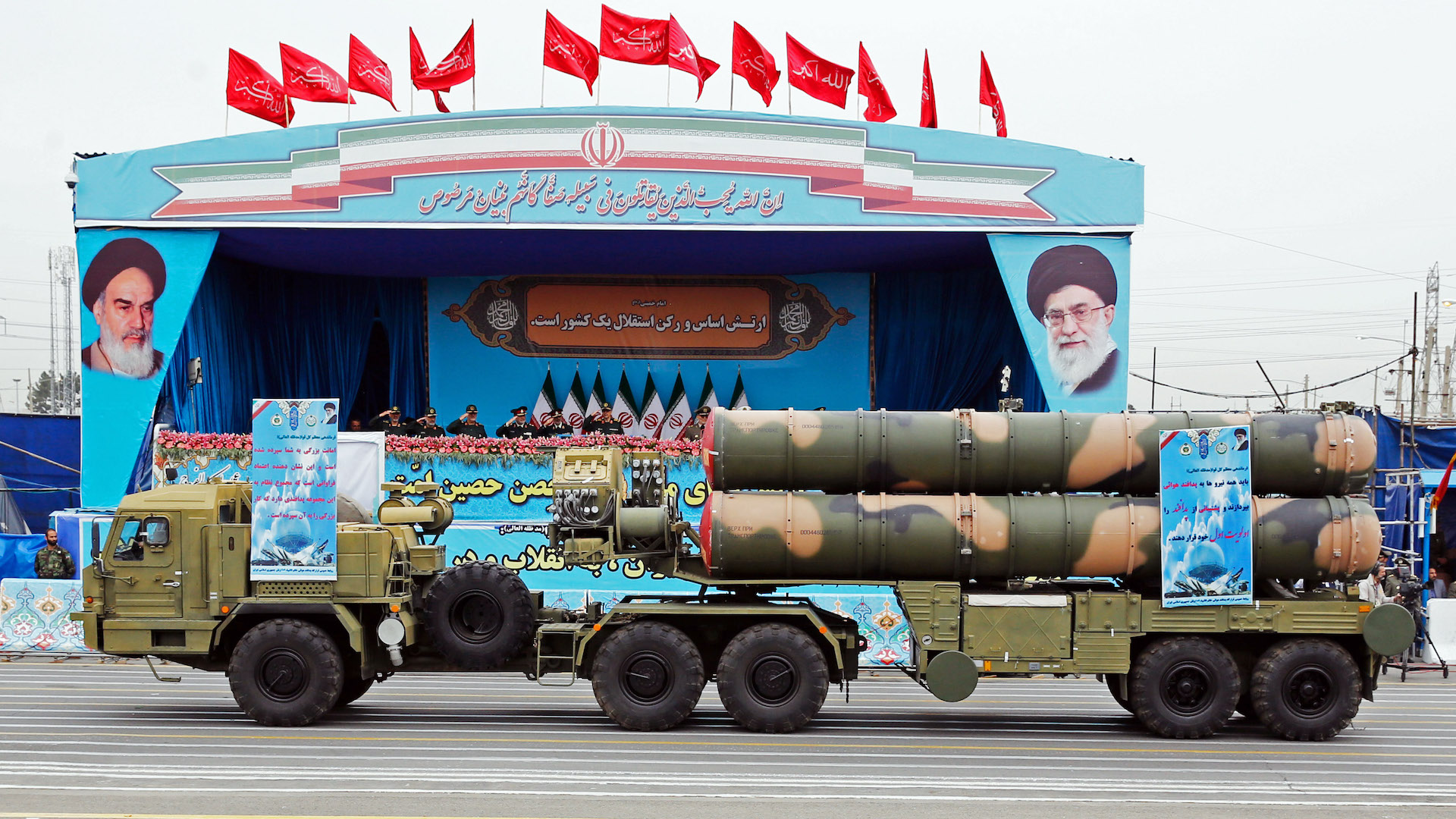 A Russian-made, S-300 missile system drives in front of the officials' stand during a military parade marking the annual Iranian National Army Day in Tehran, on April 18, 2019. - Iran's President Hassan Rouhani called on Middle East states on April 18 to "drive back Zionism", in an Army Day tirade against the Islamic republic's archfoe Israel. Speaking flanked by top general as troops paraded in a show of might, Rouhani also sought to reassure the region that the weaponry on display was for defensive purposes and not a threat.