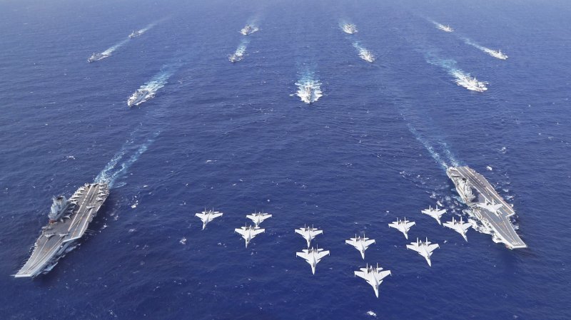 The Chinese People’s Liberation Army Navy, or PLAN has for the first time conducted dual-carrier operations in the South China Sea. The drills, involving the country’s first two in-service carriers, the Liaoning and Shandong, as well as at least 11 other vessels, also showcased the PLAN’s fast-growing air wing, with a flyby conducted by a dozen J-15 carrier-based multirole fighters. While clearly engineered for public consumption, the photo opportunity also points to the very rapid progress made by the PLAN in developing its aircraft carrier and wider blue-water capabilities.