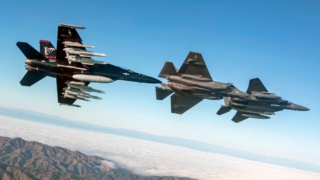 A U.S. Navy F/A-18F and F-35, both assigned to Air Test and Evaluation Squadron (VX) 9, fly over the Point Mugu Sea Range in Southern California with a U.S. Air Force F-15 during Gray Flag 2024 on Sept. 24, 2024. Gray Flag is an annual large-force test event that brings the joint force together to test and evaluate multi-domain systems in a maritime environment, ensuring our nation’s warfighters are equipped with effective, interoperable systems that will help them deter aggression, protect our nation’s prosperity and security, and return home safely to their families. (U.S. Navy photo by Lt. Cmdr. Kory Hughs)