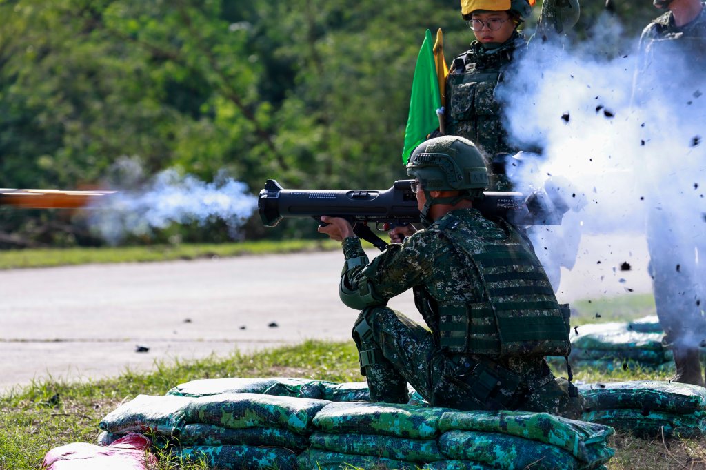 TAINAN, TAIWAN - 6 NOVEMBER: A Taiwanese conscript launches live-fire rockets using the Kestrel Rocket launcher, during an exercise at a military base in Tainan, Taiwan, 6 November, 2024. The exercise aims to examine the soldiers' ability to launch live-ammunition rockets after their compulsory conscription period was extended from four months to one year, amid escalating tensions between China and Taiwan. The United States has also recently made arms sales deals with Taipei. (Photo by Daniel Ceng/Anadolu via Getty Images)