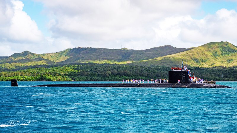 The Virginia-class fast attack submarine USS Minnesota (SSN 783) arrives onboard U.S. Naval Base Guam, Nov 26. Minnesota, the first Virginia-class fast-attack submarine to be forward deployed to Guam, joins four Los Angeles-class fast-attack submarines forward deployed in the Pacific. Regarded as apex predators of the sea, Guam's fast-attack submarines serve at the tip of the spear, helping to reaffirm the submarine forces' forward-deployed presence in support of a free and open Indo-Pacific. (U.S. Navy photo by Mass Communication Specialist 1st Class Justin Wolpert)