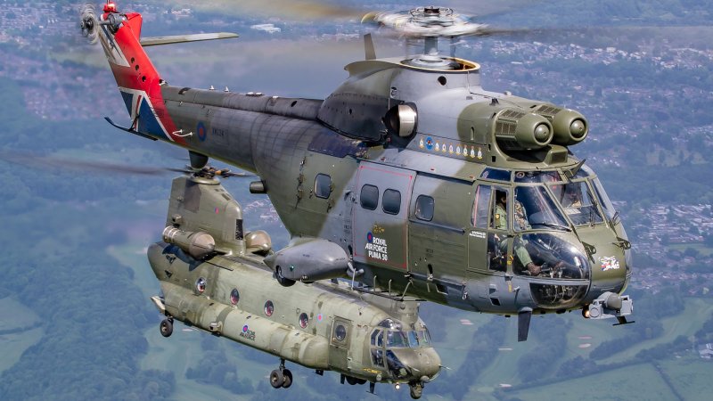 Pictured is an RAF Chinook (27(R) Squadron) flying in formation with a Puma (230 Squadron) over RAF Cosford. After a 3-year Covid-enforced break, the RAF Cosford Air Show will take place on 12 June 2022. The last RAF-organised air show, it attracts 50,000 people to the airfield and incorporates a flying display, static aircraft displays, STEM displays and vintage villages. The highlights of the flying will be the RAF Red Arrows, BBMF, Typhoon display team, Belgian F16 and French Rafale. The RAF F35B displayed at the air show for the first time.